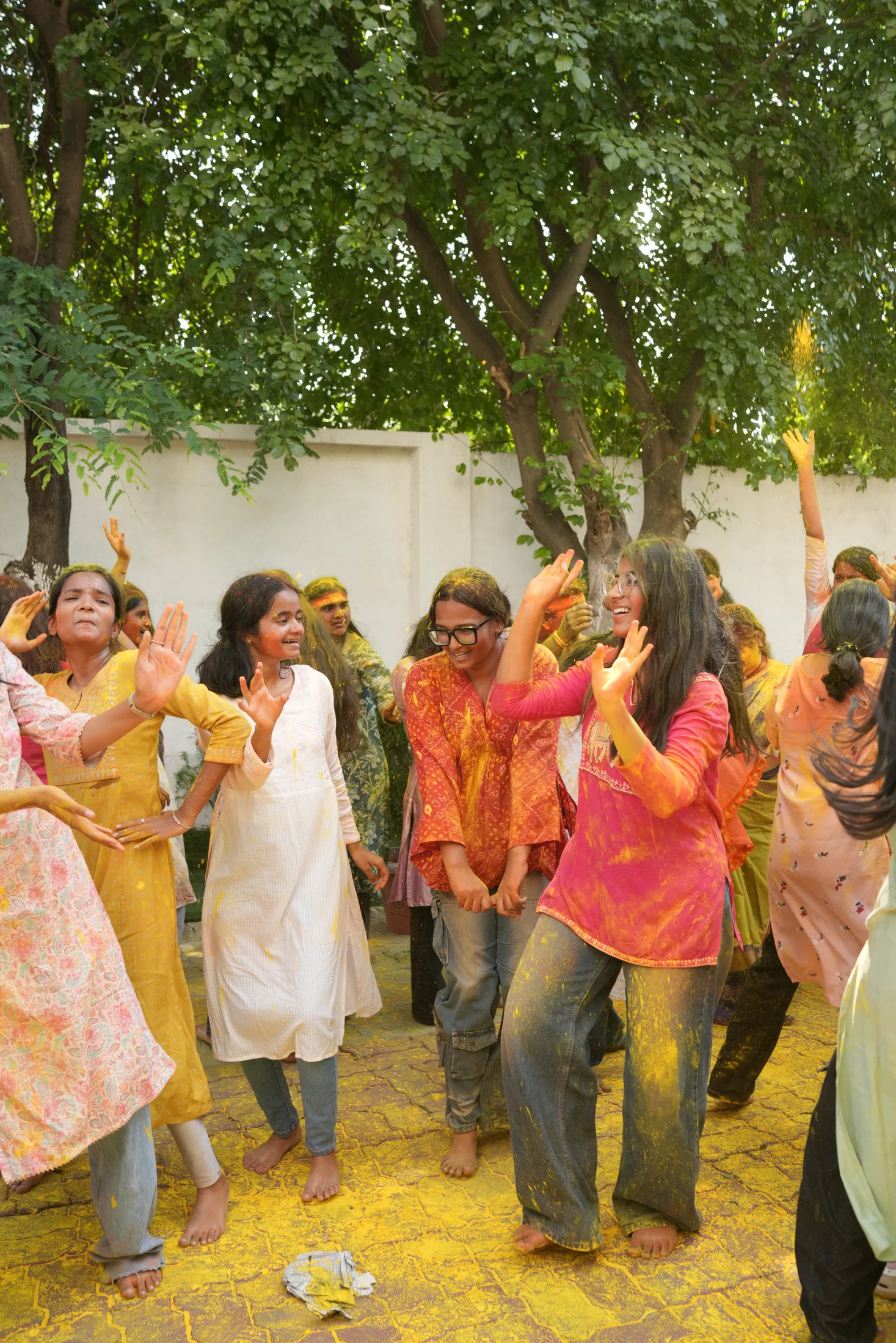 Students dancing in a festive circle