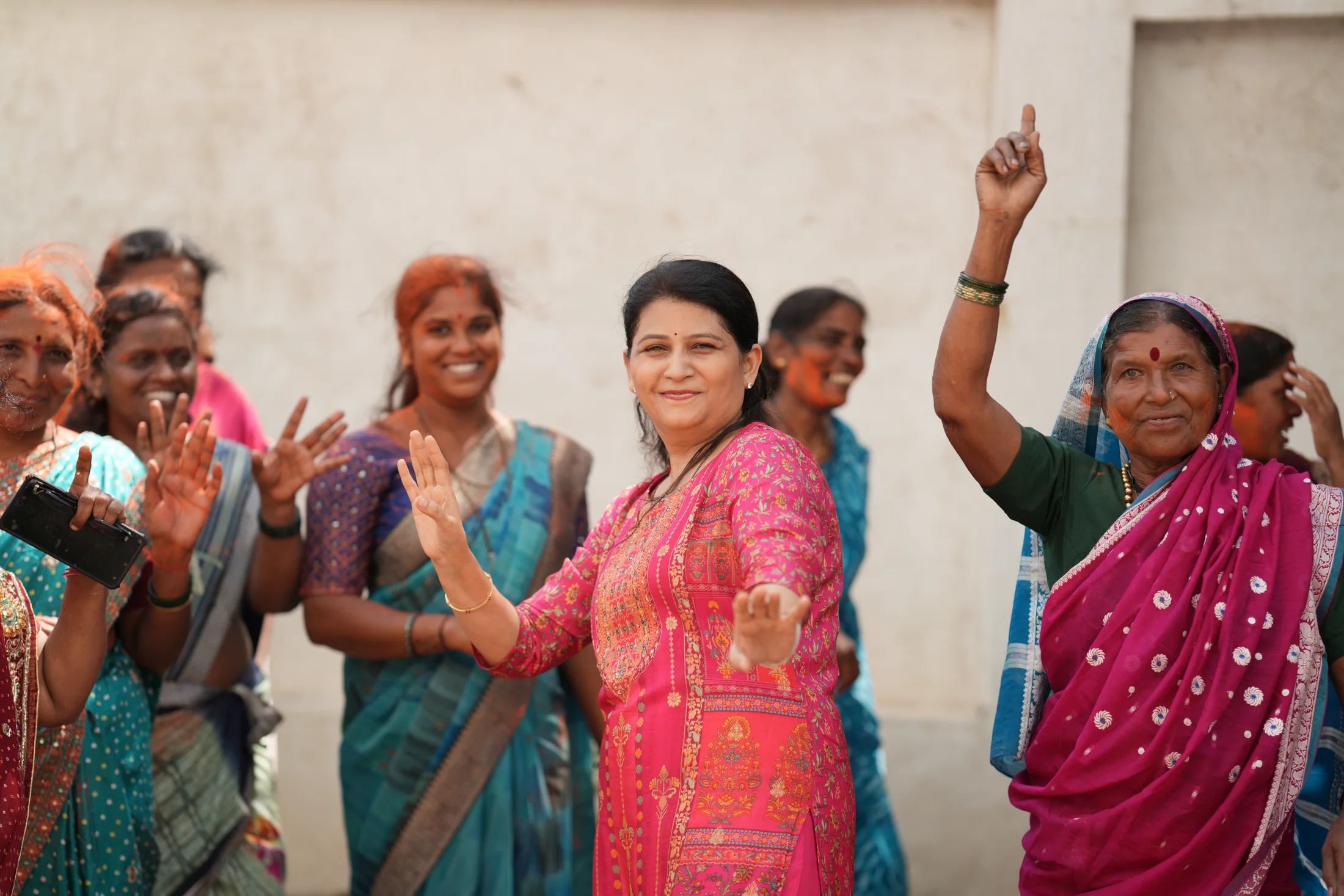 Women participating in devotional singing