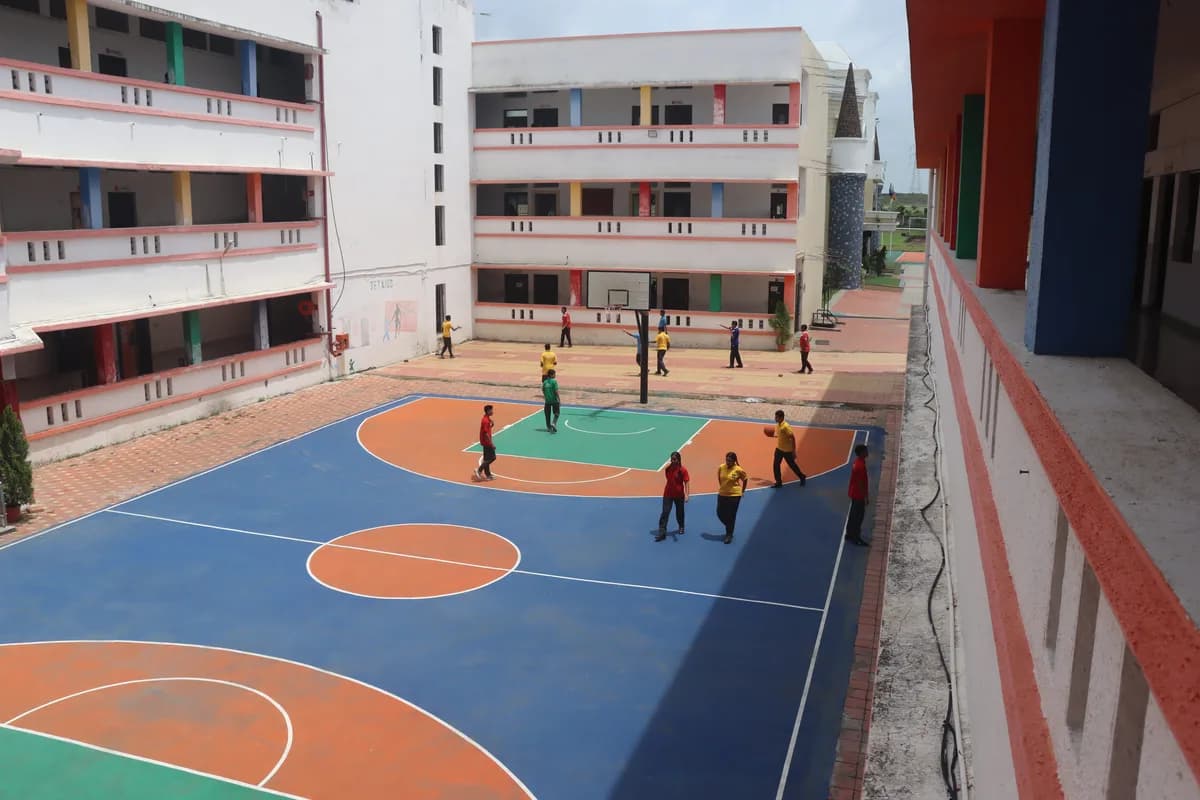 Students playing and running on the sports field