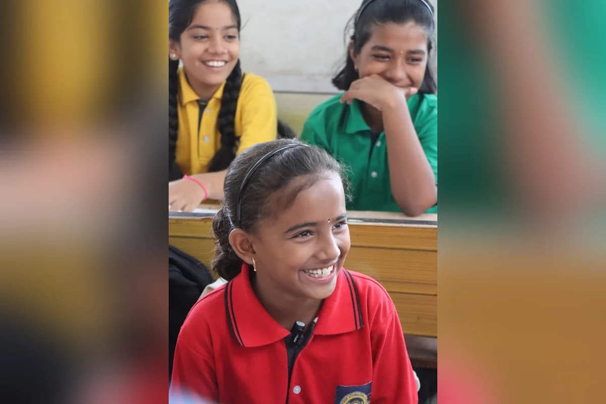 Primary school students collaborating in classroom
