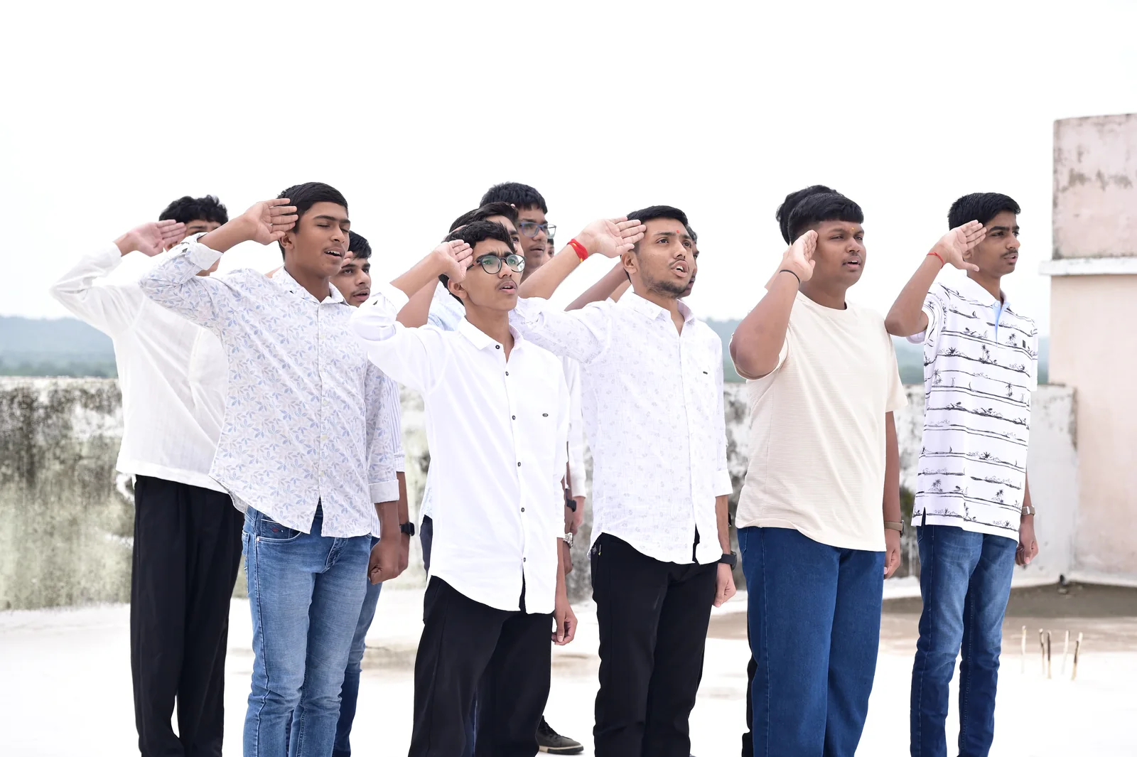 Boys cohort offering a crisp salute